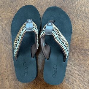 Oleyo Woven Strap Sandals with Black Soles